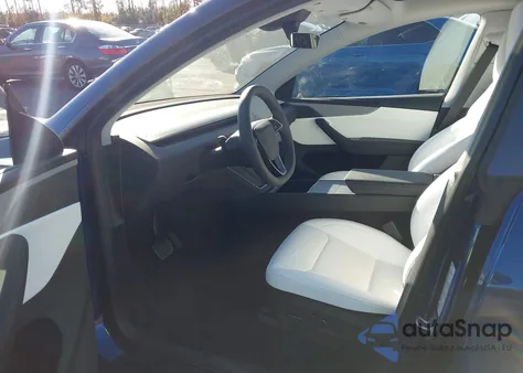 2026 Tesla Model Y Long Range Dual Motor All-Wheel Drive from USA, damaged, VIN 7SAYGDEDXTA457065